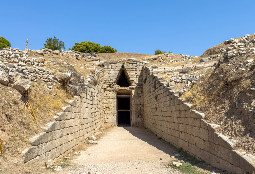 Mycenae, Greece. Tomb of Clytemnestra at the archaeological site, blue sky, sunny day